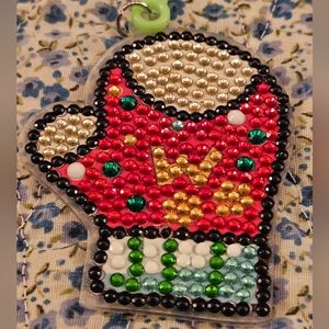 Red and White Key Holder with Playful Mitten Design